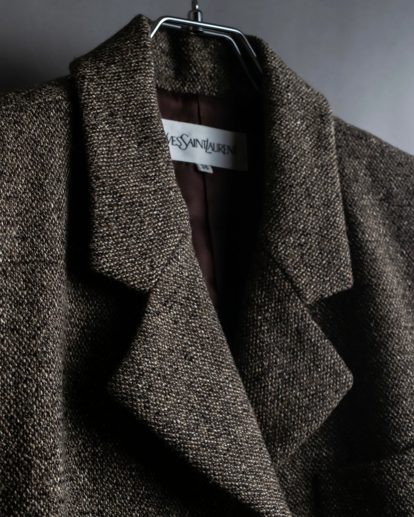 "Yves Saint Laurent Rive Gauche"
Fly front tweed chester coat