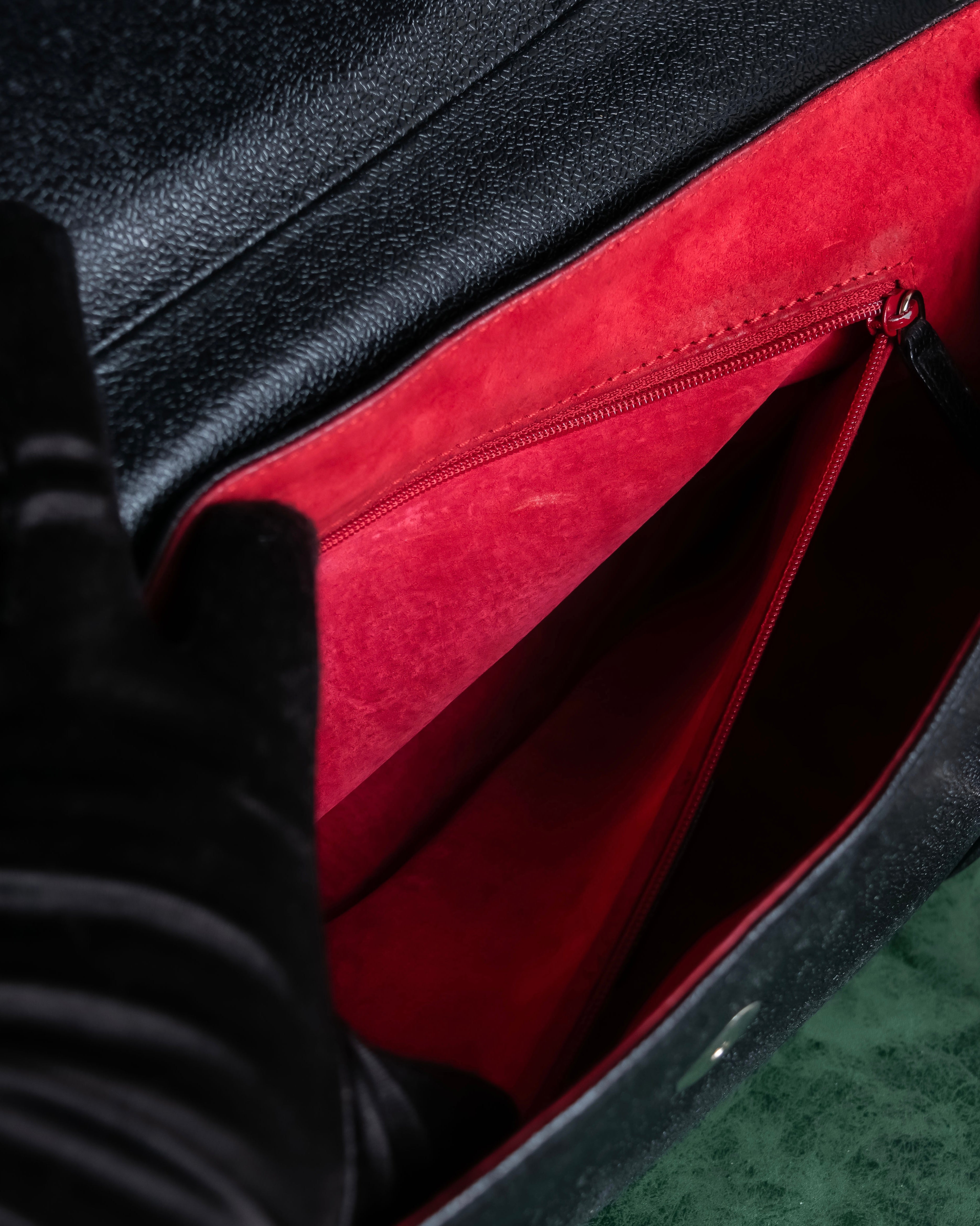 "BVLGARI" Horizontal form engraved logo leather bag