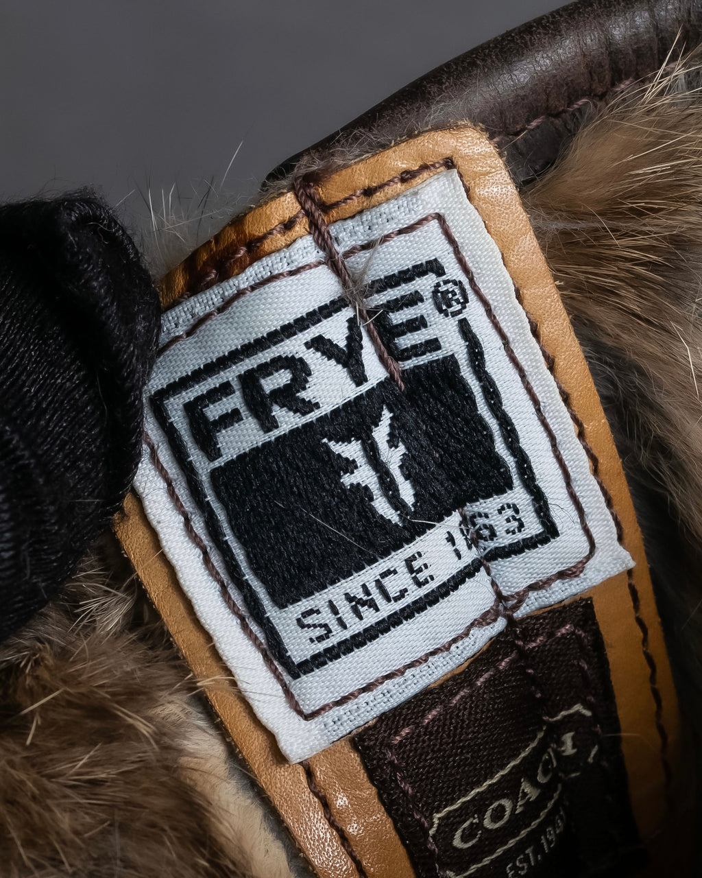 "COACH×FRYE" Brass buckle design shearling lined biker boots