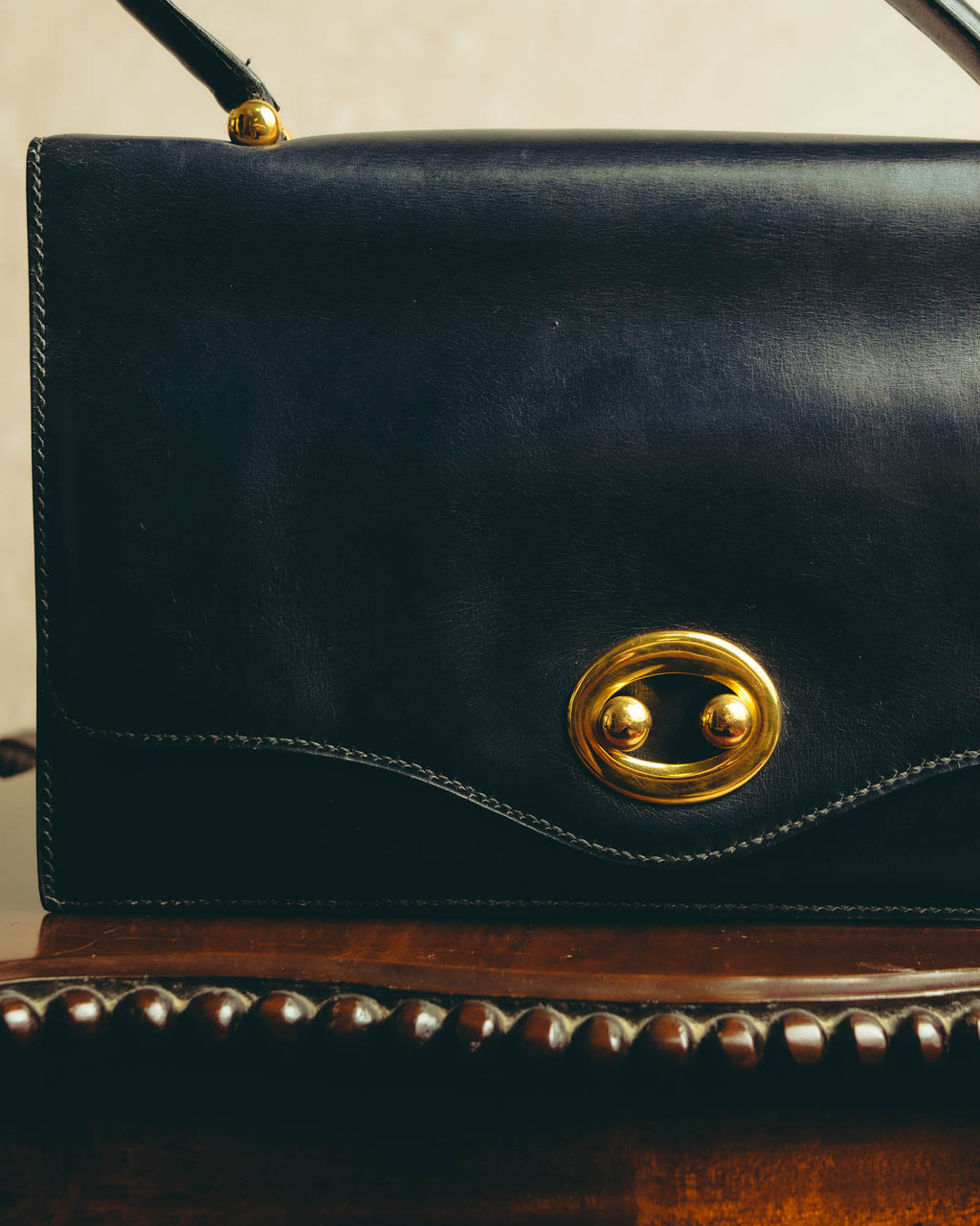 -SPECIAL- “HERMÈS” 50’s-60’s sculptural oval clasp midnight navy leather handbag