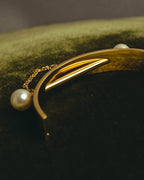 "Chloé" 2010's Gold tone pearl hinged cuff bracelet