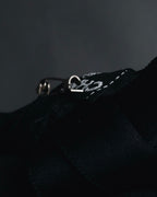 "CHANEL" 90’s black satin and grosgrain ribbon brooch