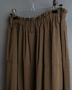 "ISSEY MIYAKE" Gathered waist detail button slide flared skirt