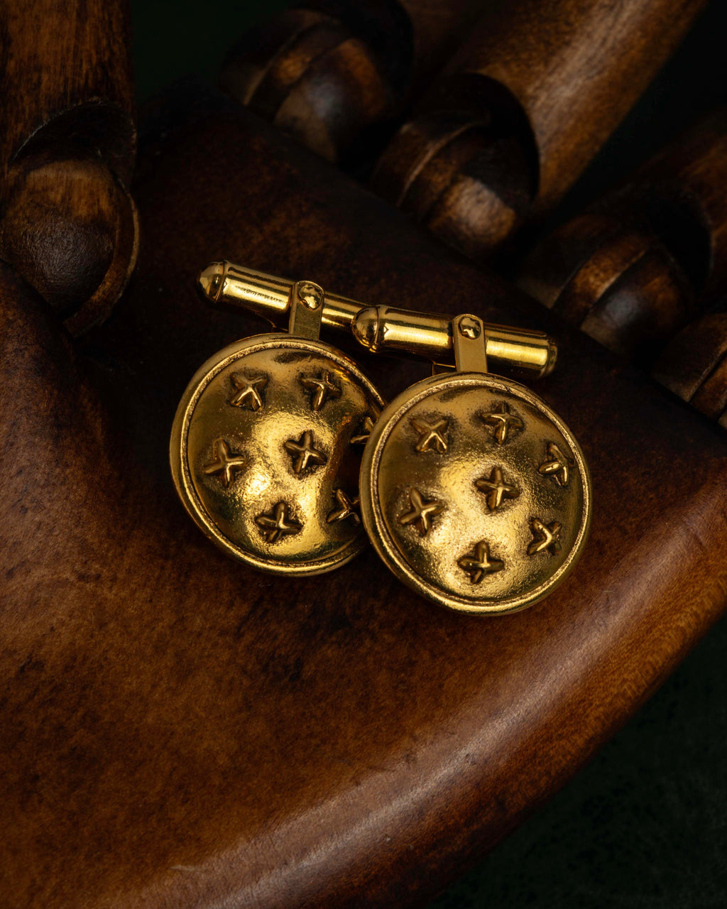"CHANEL" Dome relief cross motif gold cufflinks