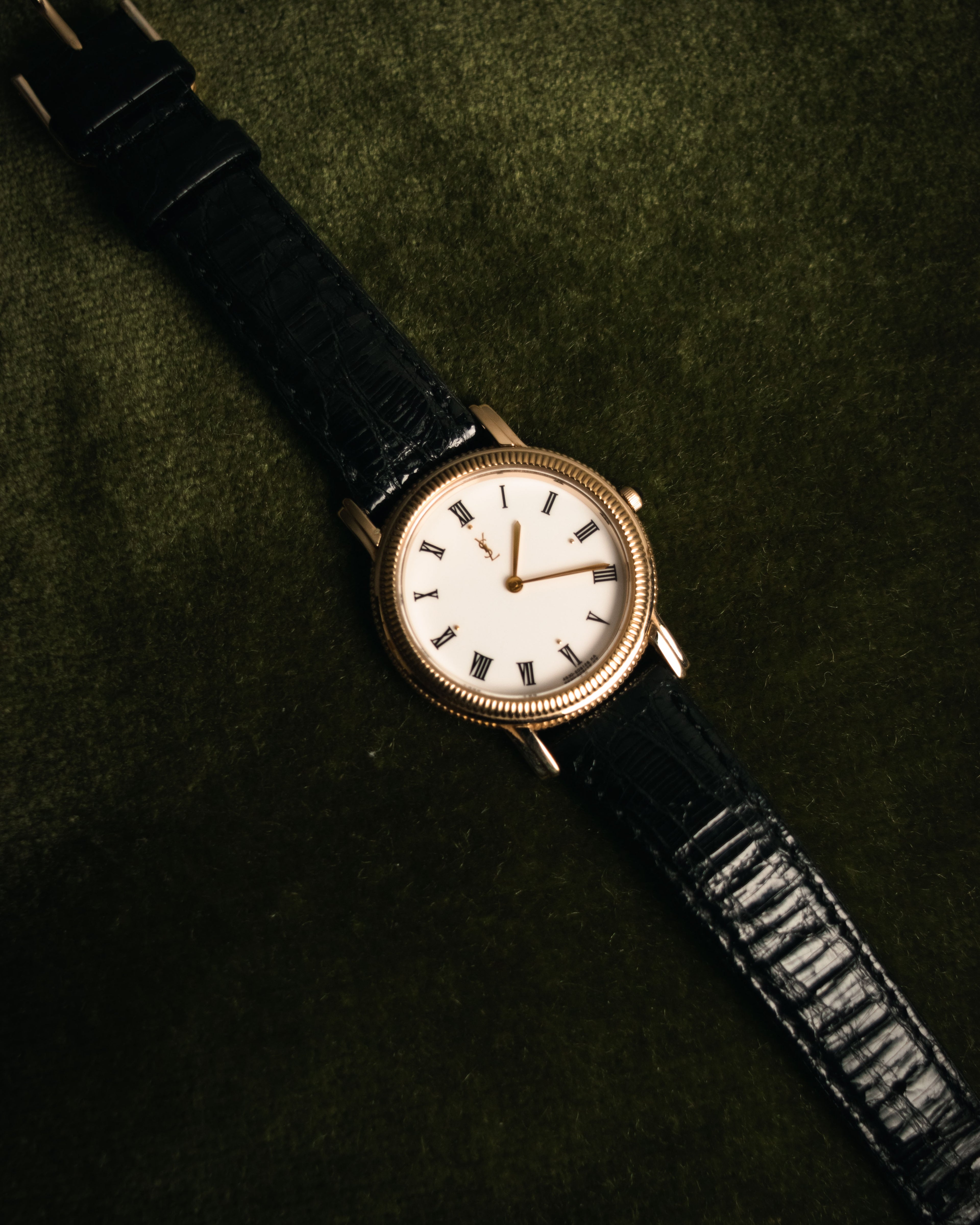 “Yves Saint Laurent” 80’s-90’s coin edge quartz leather watch