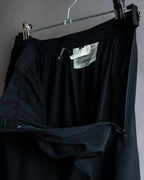 "tricot COMME des GARCONS"  Lace design at hem flare skirt