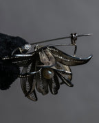 "Vintage petal motif broach"