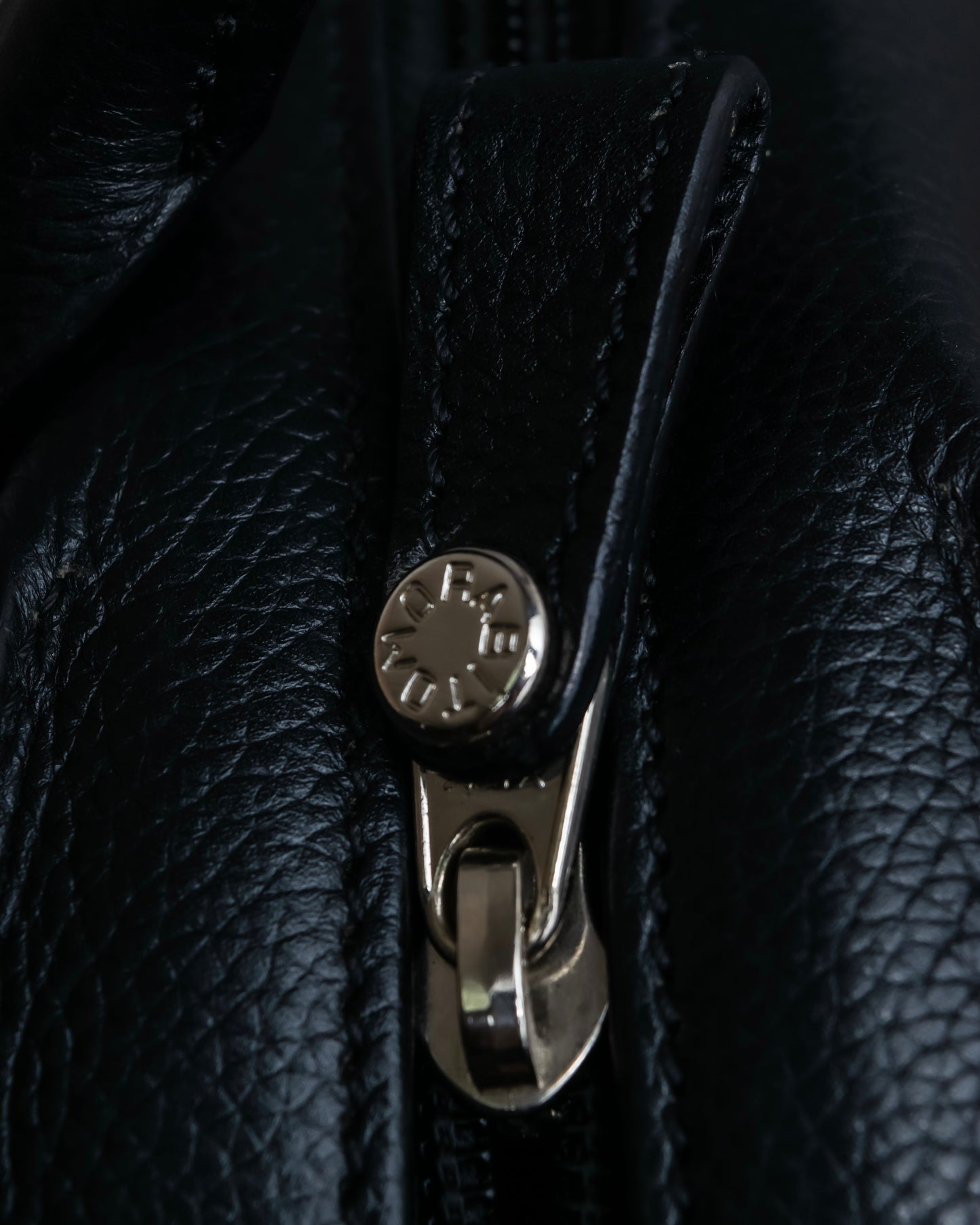 "MORABITO" Half moon design grained leather handbag