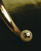"DIOR" 10's-20's Gold tone pearl star open bangle