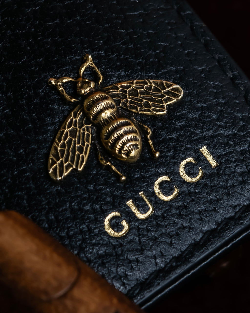 "GUCCI" Gold bee motif animalier bi-fold leather wallet