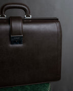 "BURBERRY" Metal belt design embossed PVC briefcase