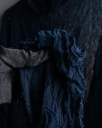 "ISSEY MIYAKE PERMANENTE"
Washed high neck sheer pullover