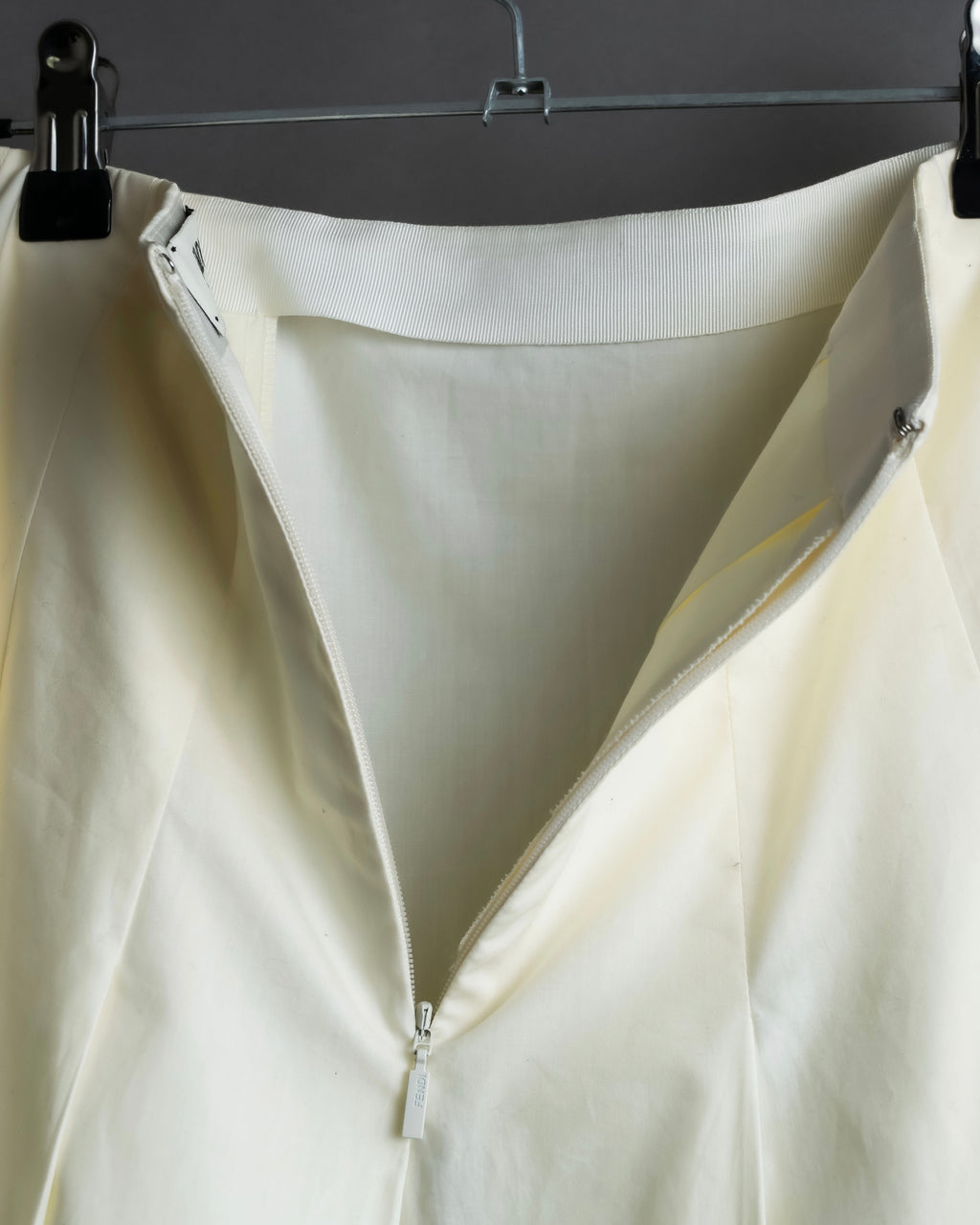 "FENDI" hole pattern and tack designed skirt