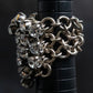 "SERGE THORAVAL" Crystal top chain braided ring