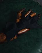 "CHANEL" 90’s black satin and grosgrain ribbon brooch