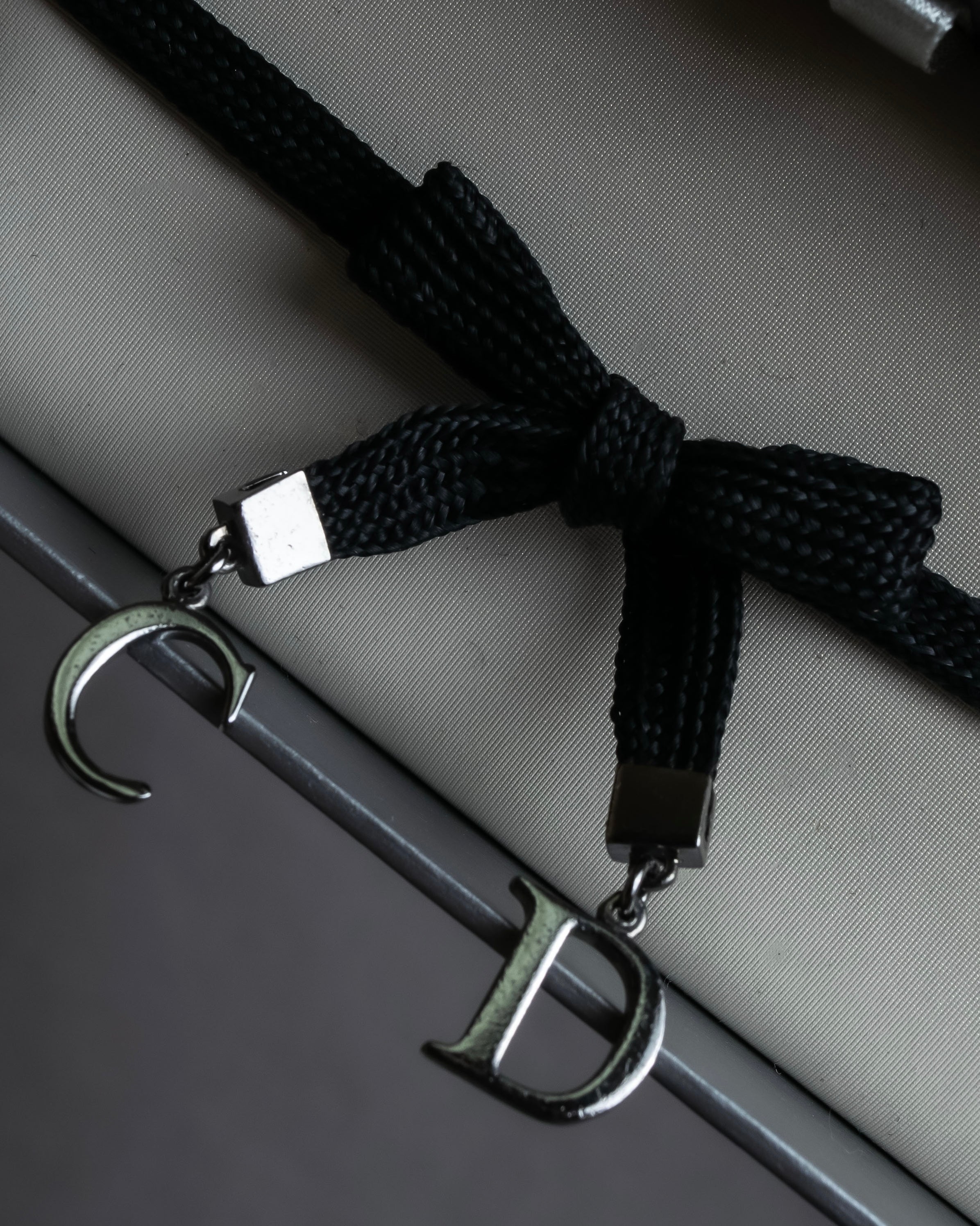 "Christian Dior" Logo design charm ribbon tie bracelet