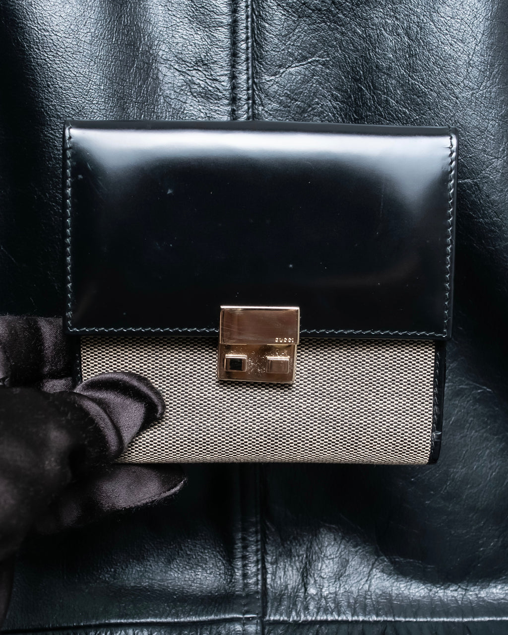 "GUCCI" Canvas and leather bi-fold wallet