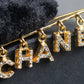 "CHANEL" Logo motif gold safety pin brooch