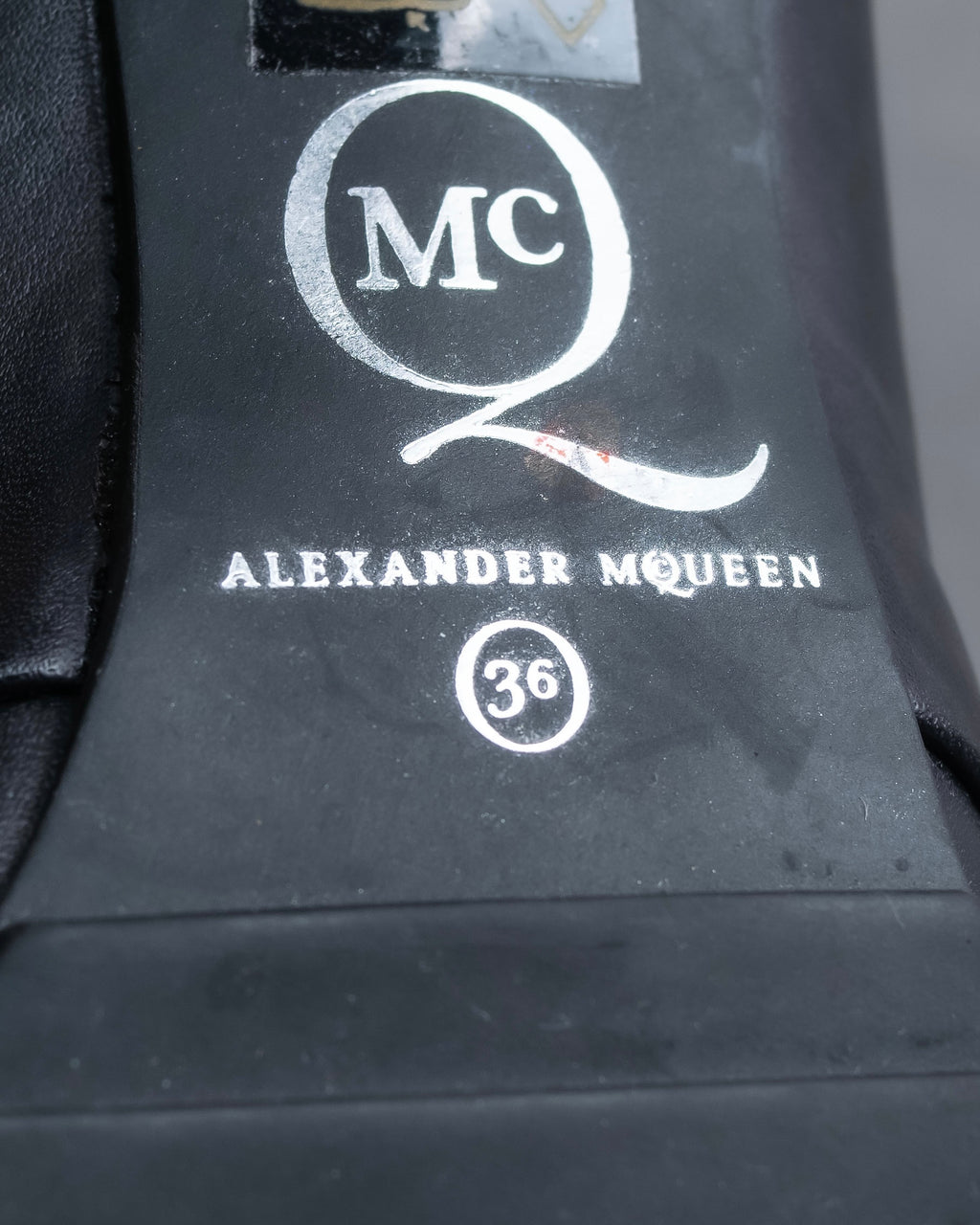 Alexandar McQueen" Studs & belt design heel boots
