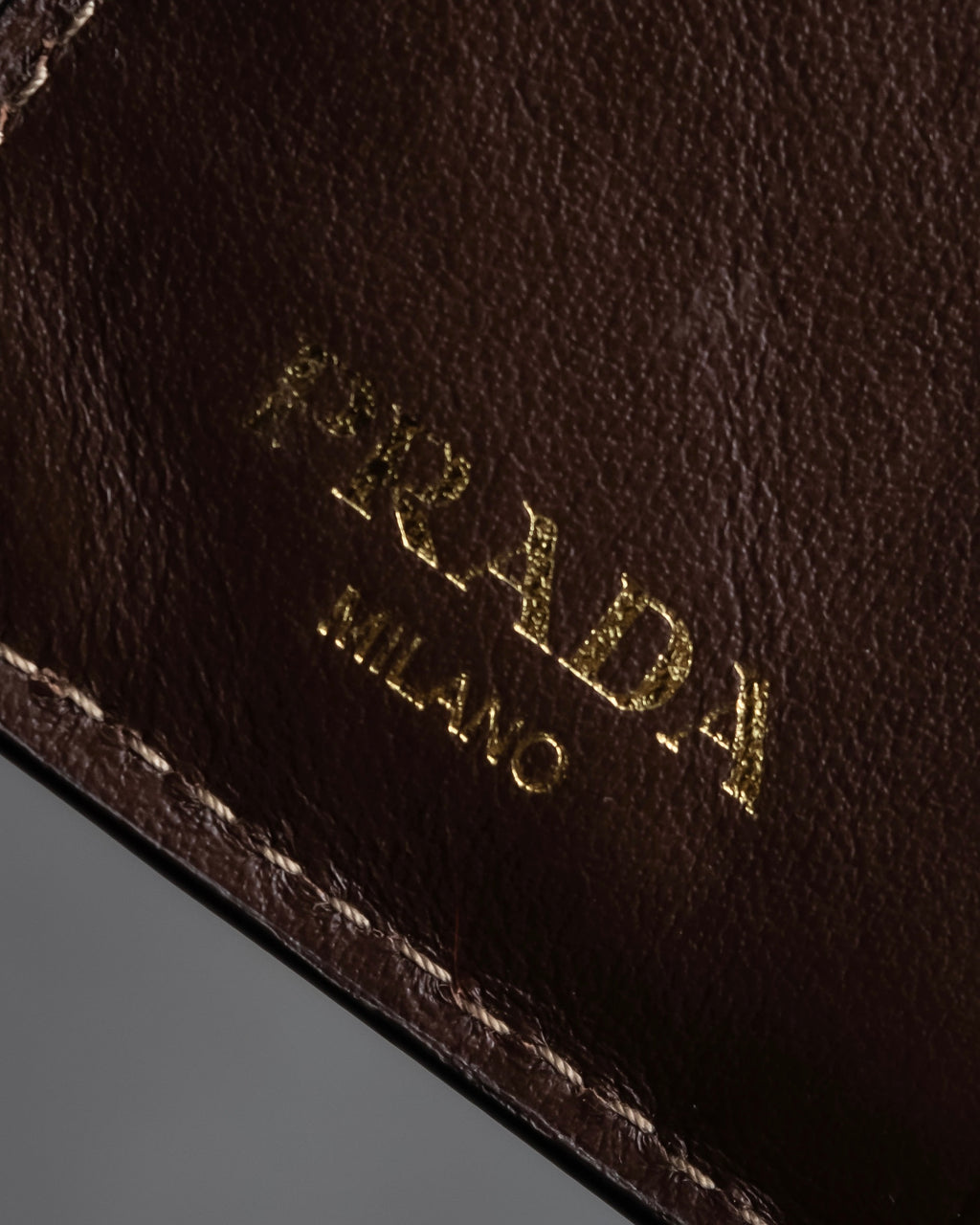 "PRADA" Logo engraved canvas＆leather combination short wallet