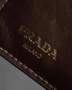 "PRADA" Logo engraved canvas＆leather combination short wallet