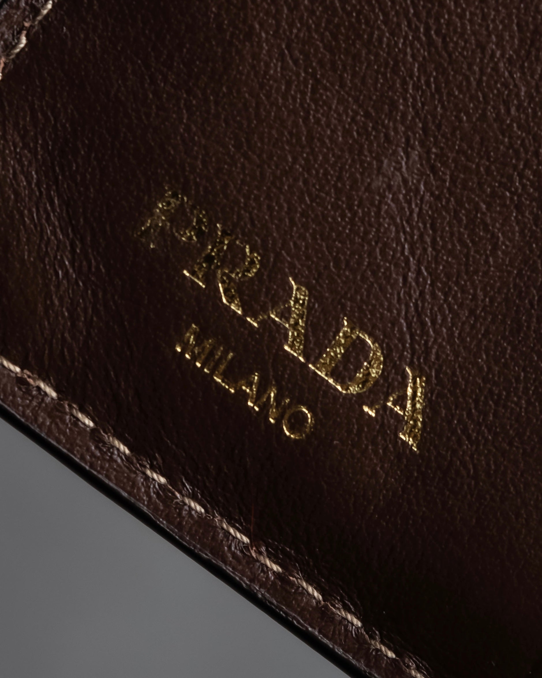 "PRADA" Logo engraved canvas＆leather combination short wallet