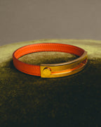 "Hermès" 00's Vibrant orange leather bracelet