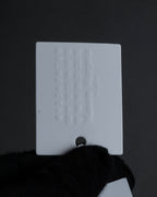 "MAISON MARGIELA" Twisted cord design brass bangle