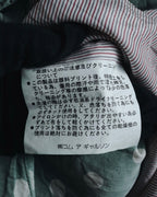 "COMME des GARÇONS HOMME"
Early 90s polka-dot rayon tailored vest