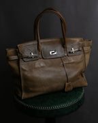 "Mademoiselle Accessories"
 Silver parts design leather one handle bag