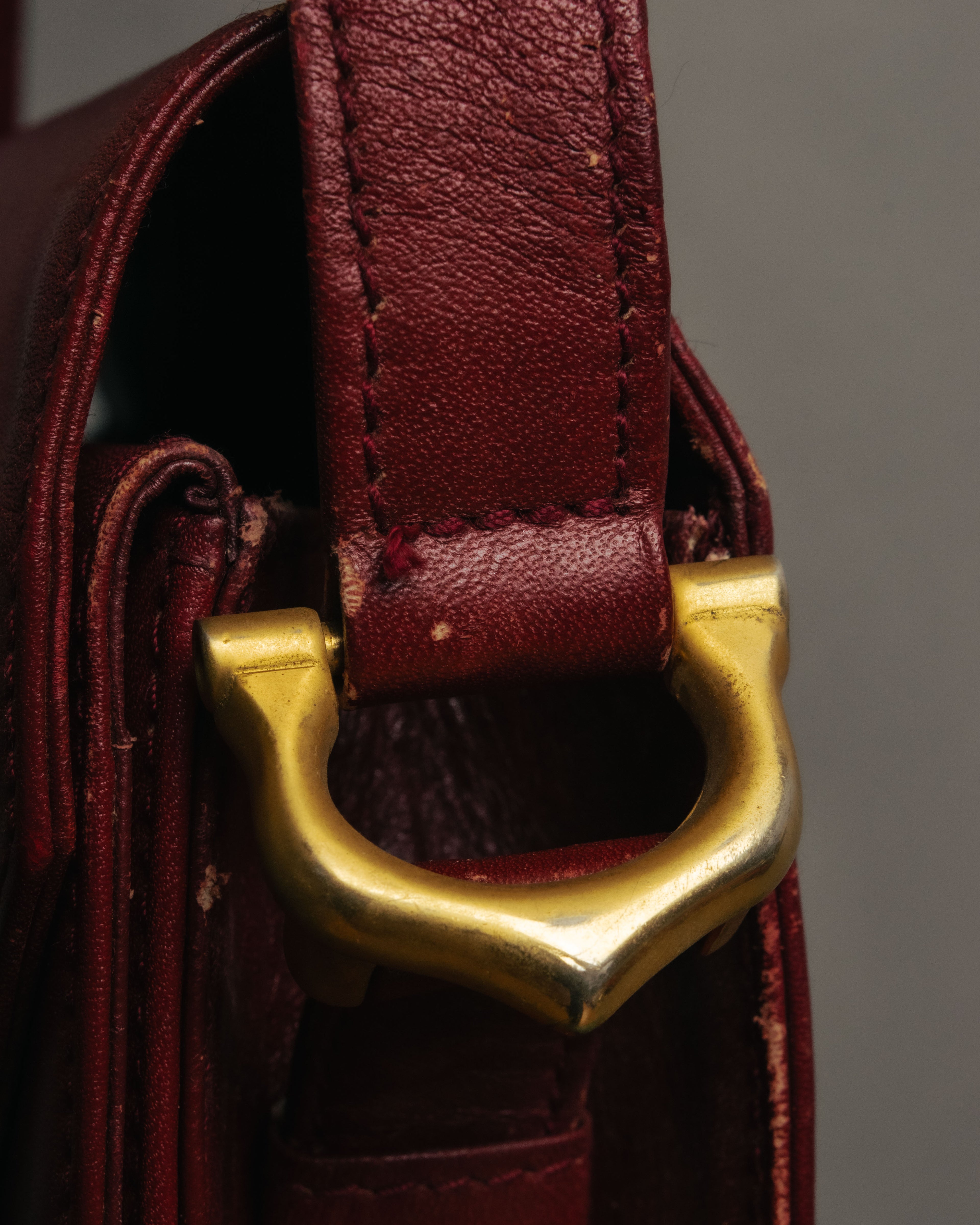 “Cartier” 80’s-90’s Must de Cartier burgundy leather shoulder bag