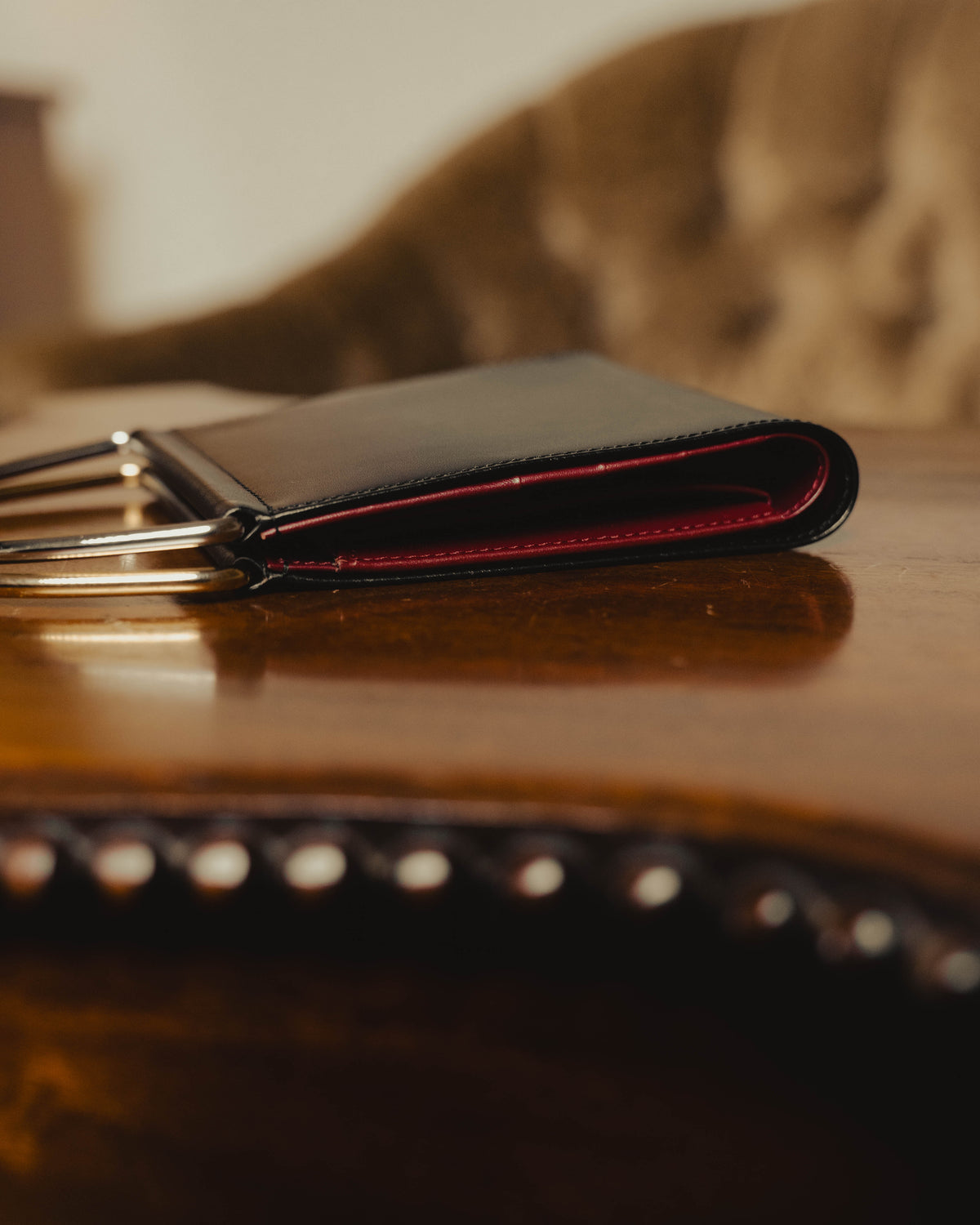 "Cartier" 80's Sculptural ring-handle leather wallet