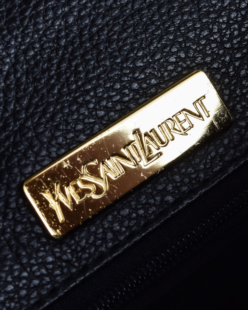 "YVES SAINT LAURENT" Hand stitched design trapezoid leather bag