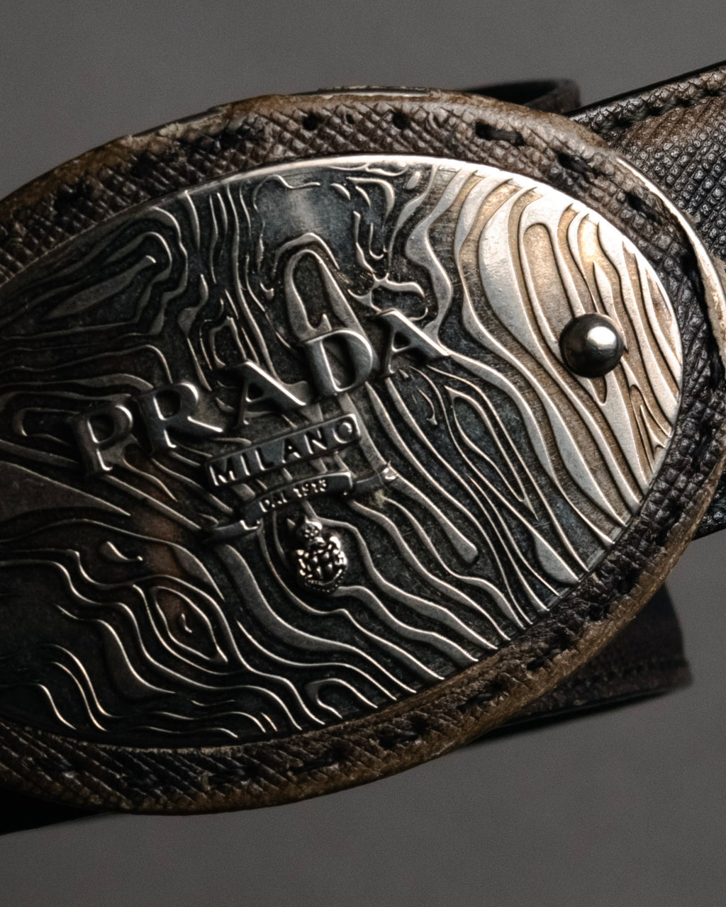 “PRADA” 2010’s Saffiano camouflage relief logo buckle
leather belt