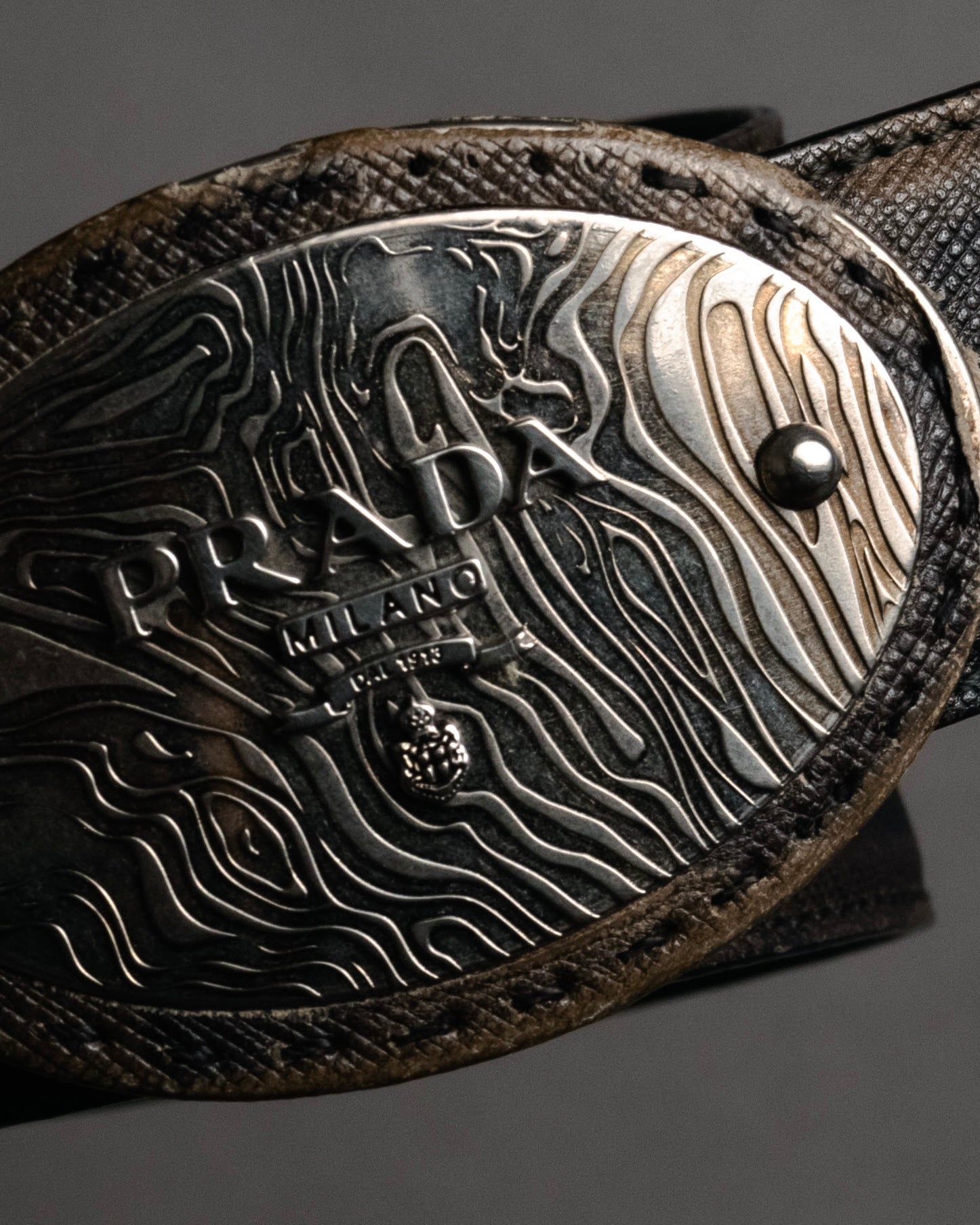 “PRADA” 2010’s Saffiano camouflage relief logo buckle
leather belt