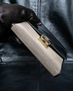 "GUCCI" Canvas and leather bi-fold wallet