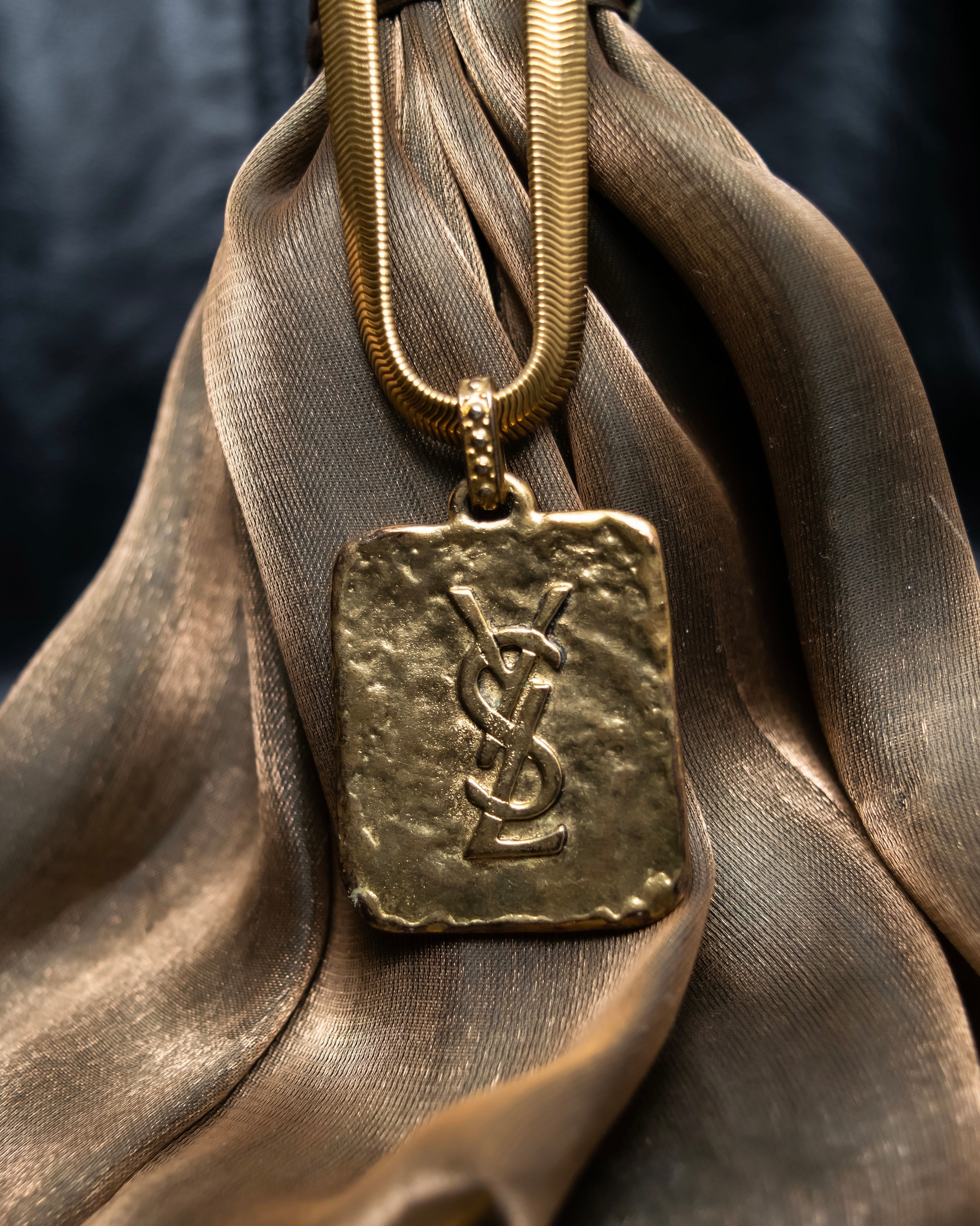 "Yves Saint Laurent" YSL logo plate gold necklace