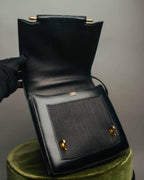 -SPECIAL- “HERMÈS” 80’s-90’s Camargue black leather and canvas shoulder bag