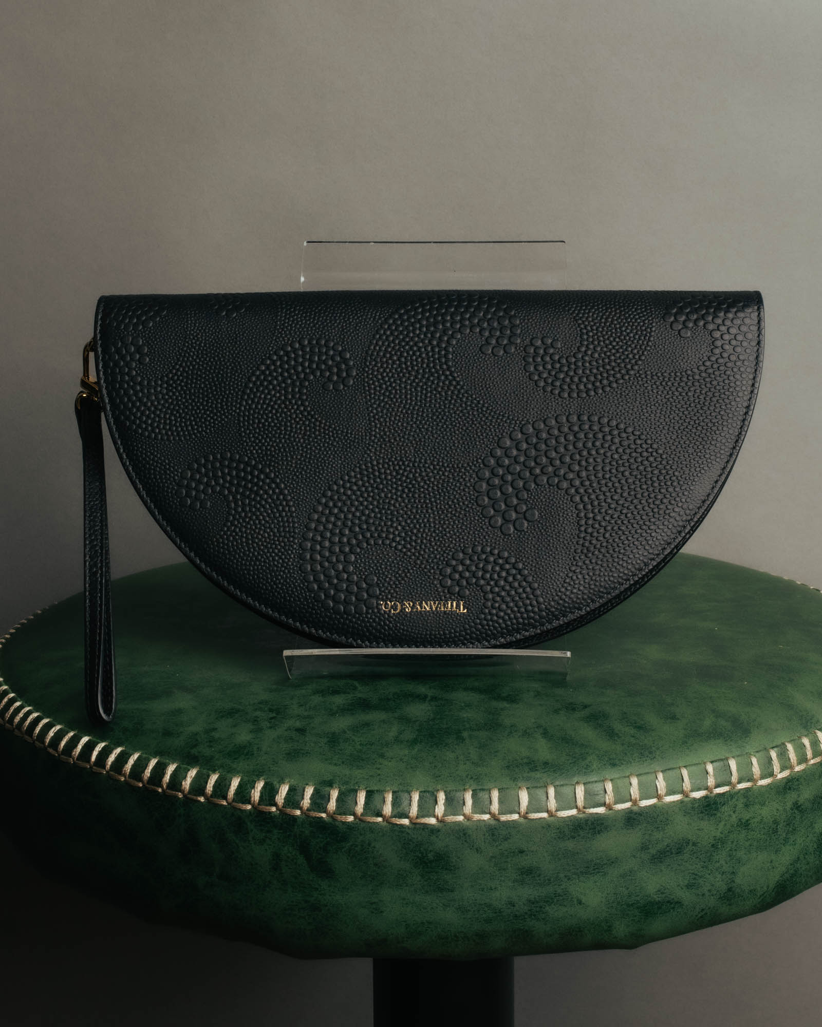 "Tiffany & Co." 10's-20's Embossed leather wristlet wallet
