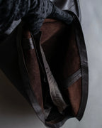 "HARVEY LOGAN" Diagonal cut design lamb leather flare skirt