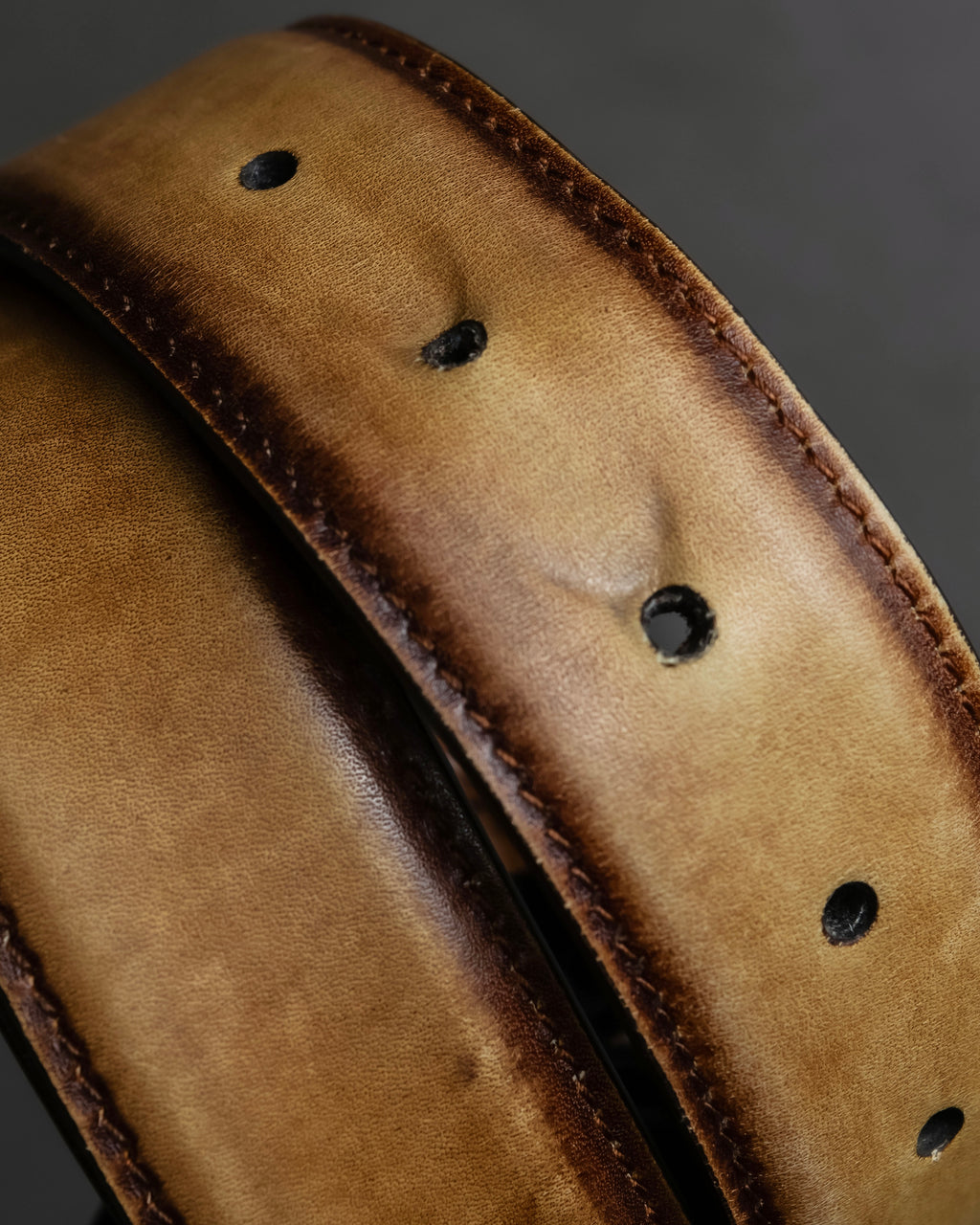 "Berluti" Patina finish curved buckle leather belt