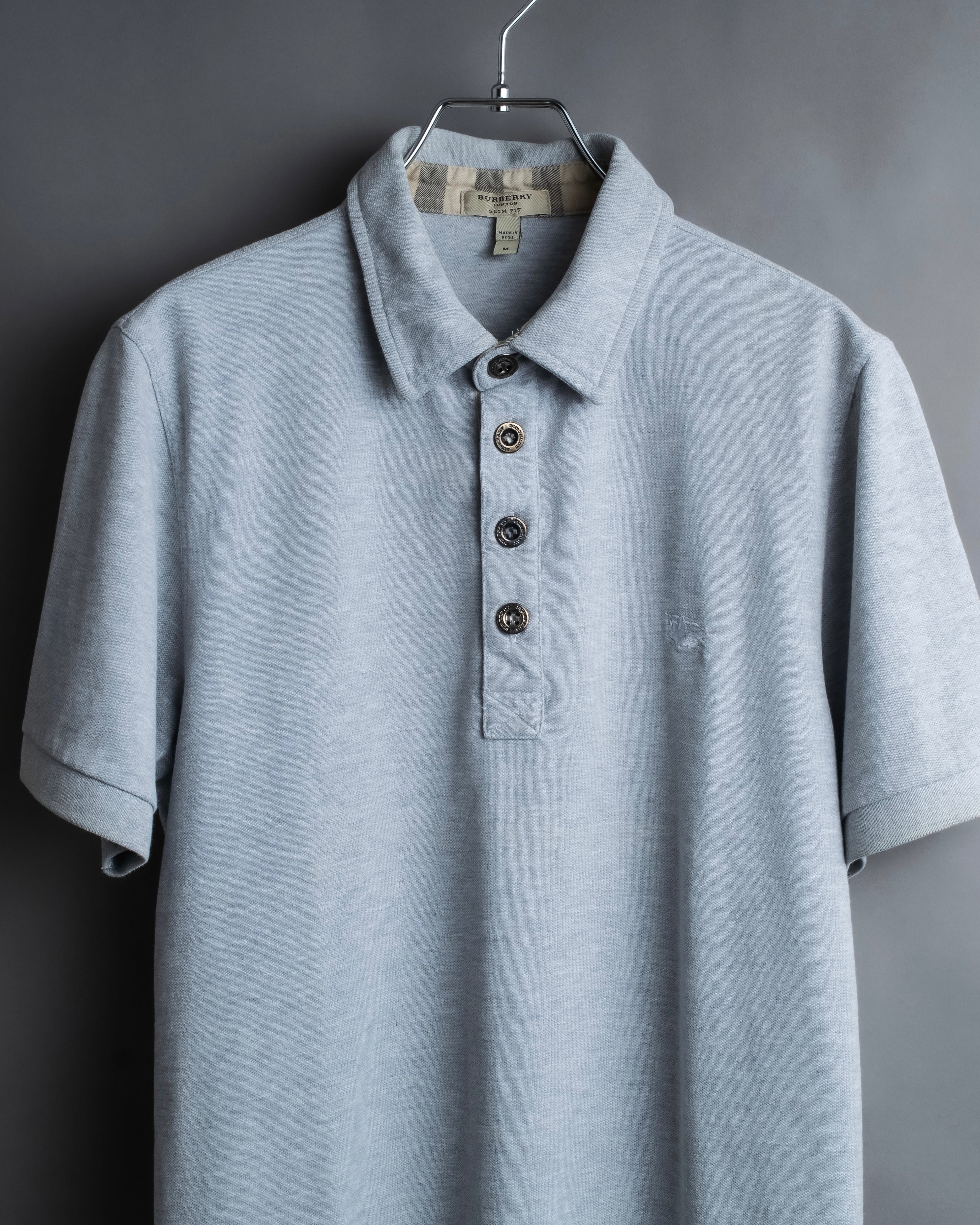"BURBERRY" Knight logo engraved metal button polo shirt