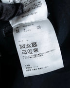 "JOHN LAWRENCE SULLIVAN"
 Large lapel double-breasted mid length coat