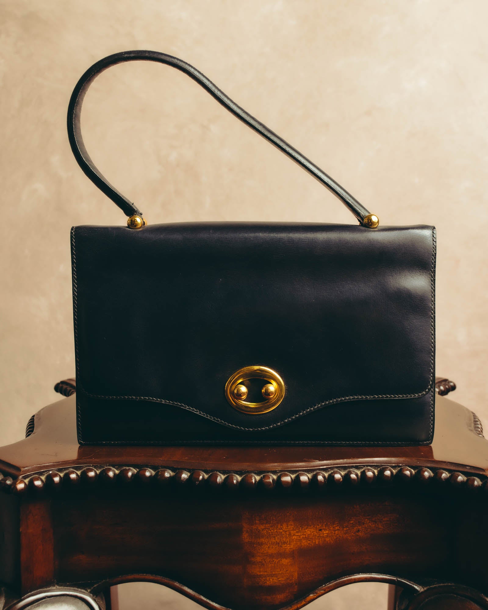 -SPECIAL- “HERMÈS” 50’s-60’s sculptural oval clasp midnight navy leather handbag