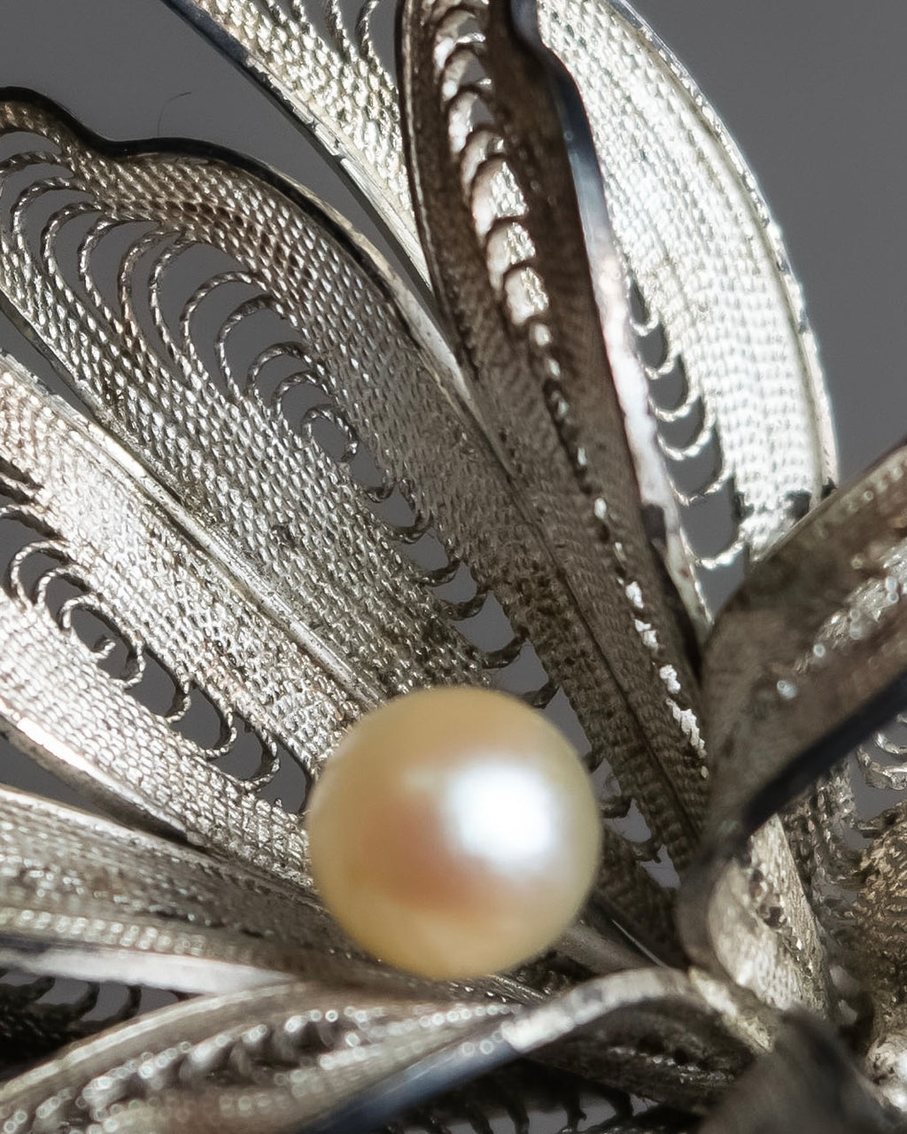 "Vintage petal motif broach"