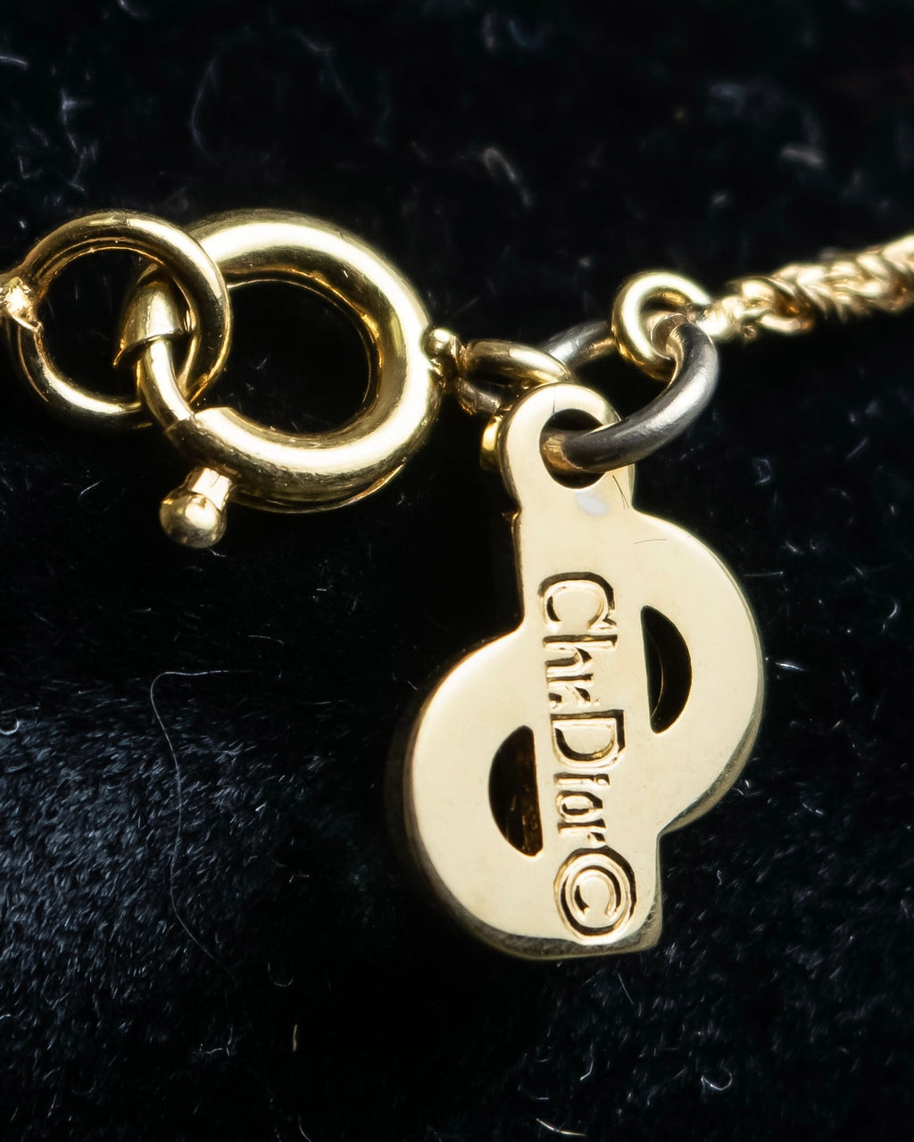 "Christian Dior" Trotter logo engraved gold pendan