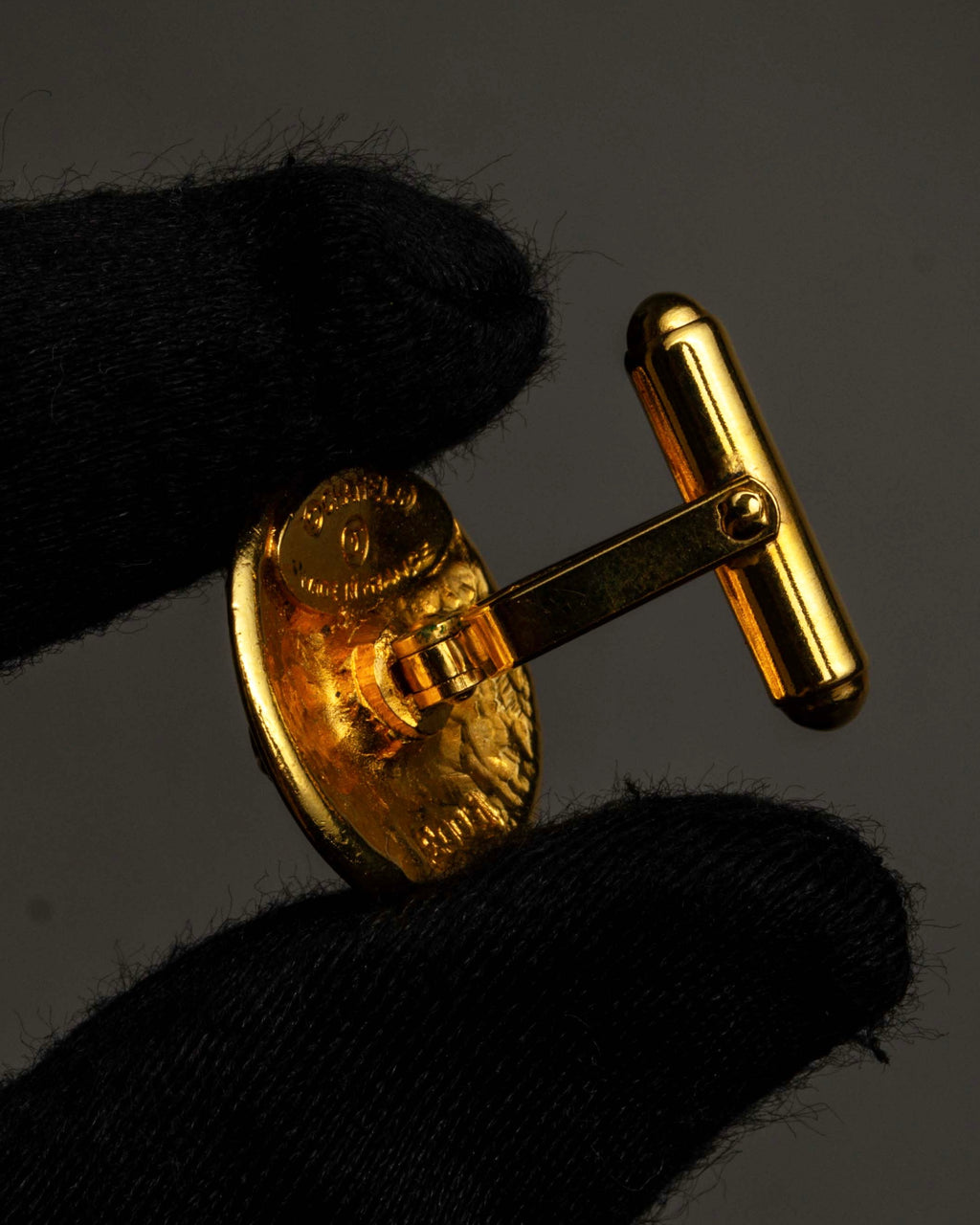 "CHANEL" Dome relief cross motif gold cufflinks
