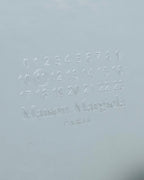 "MAISON MARGIELA" White grain leather round zipper wallet