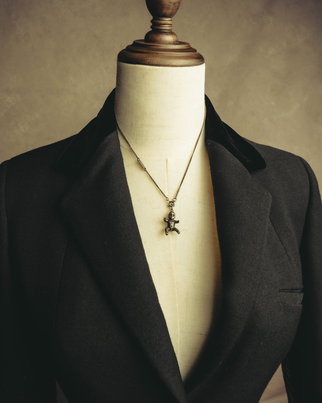 "Saint Laurent" 10's-20's Sculptural doll pendant necklace