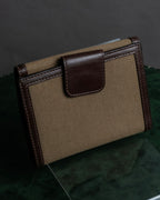 "PRADA" Logo engraved canvas＆leather combination short wallet